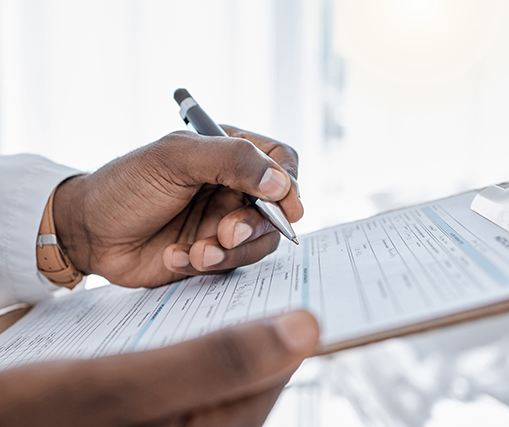 Insurance document next to calculator